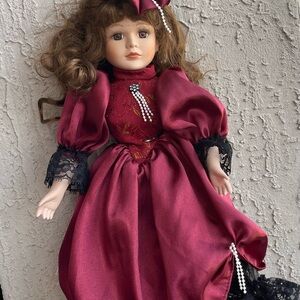 Vintage Burgundy Porcelain Fashion Doll with Lace Trim
